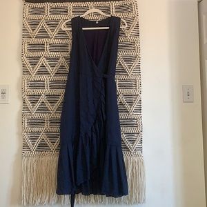 Sleeveless navy blue wrap dress
